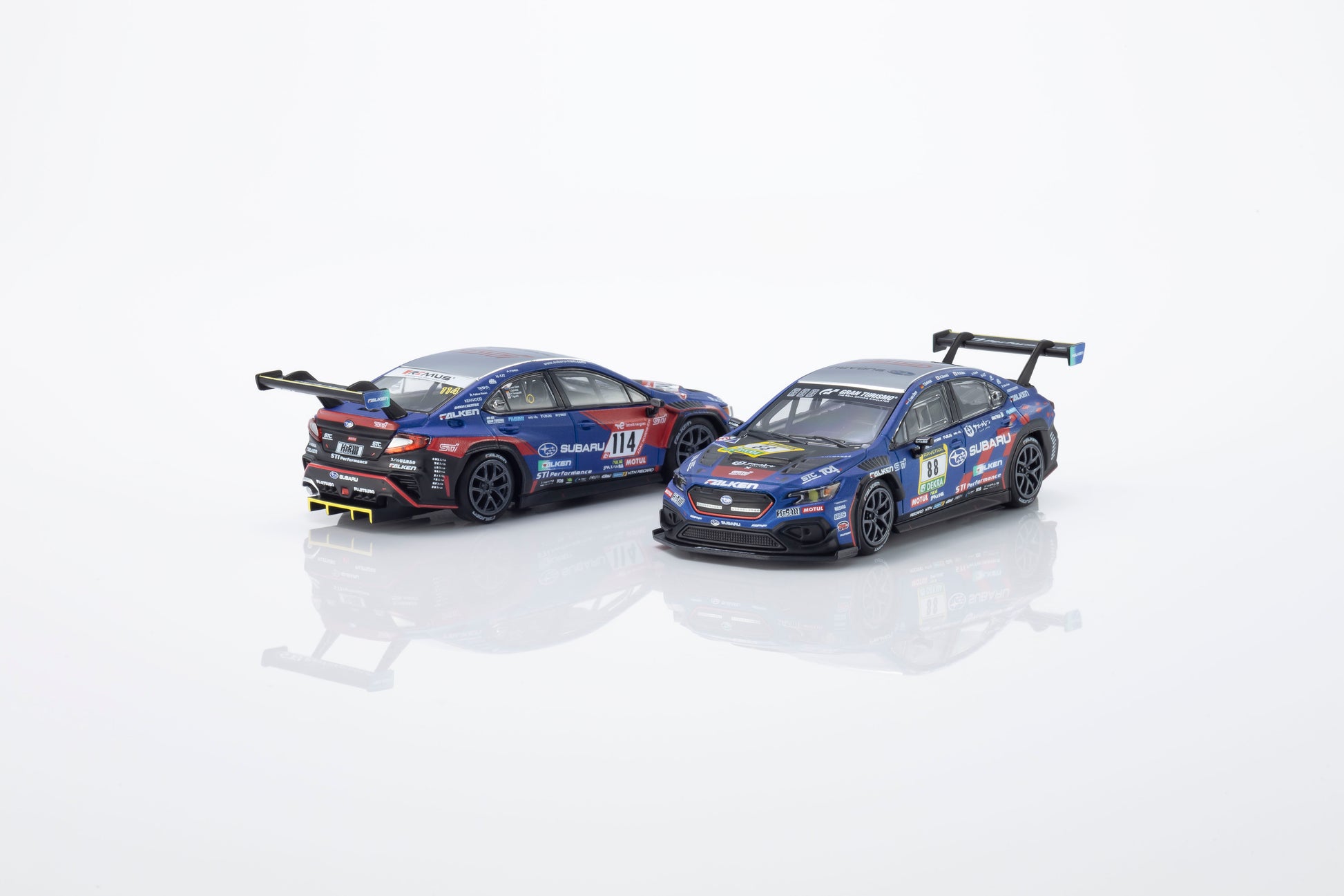 Kyosho 1:64 Subaru WRX STI NBR 2024 MOTN model with activated headlights and taillights.