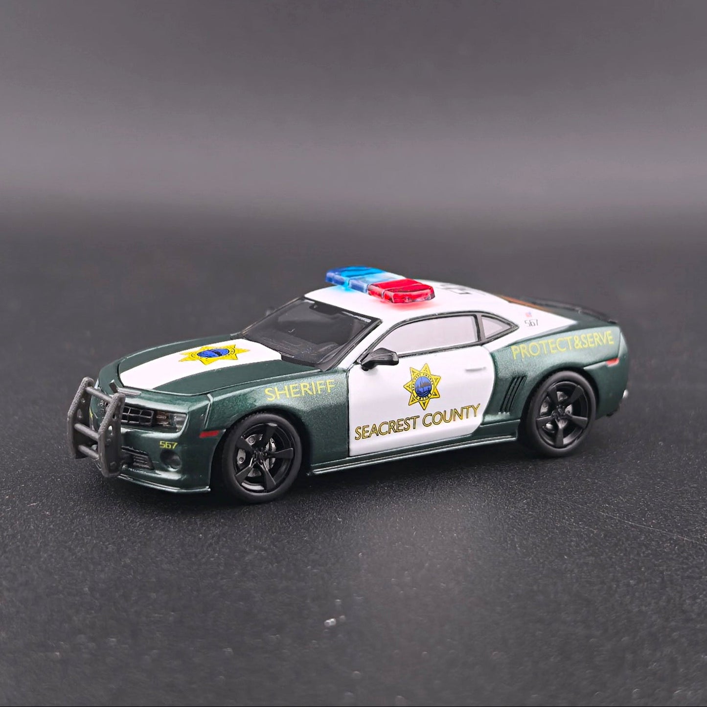 1+1 Model 2010 Chevrolet Camaro SS Police from Need for Speed Hot Pursuit with opening hood, detailed engine and extra wheels.