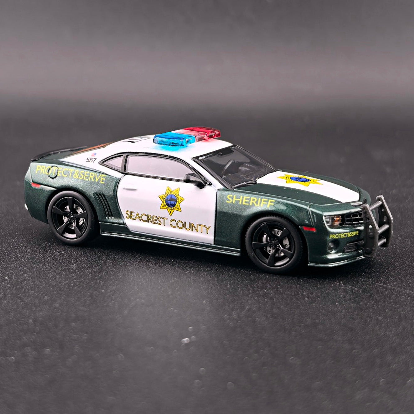 1+1 Model 2010 Chevrolet Camaro SS Police from Need for Speed Hot Pursuit with opening hood, detailed engine and extra wheels.