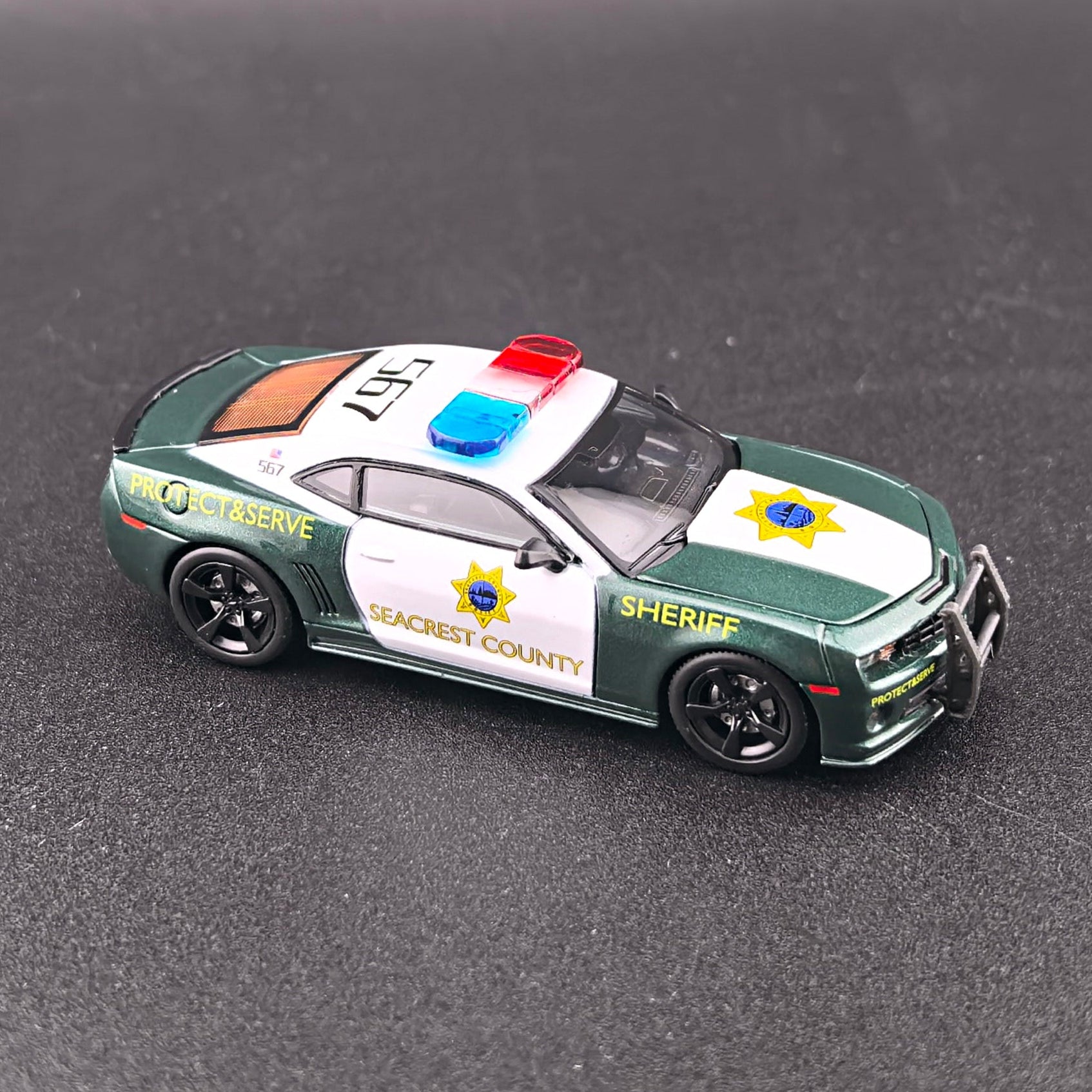 1+1 Model 2010 Chevrolet Camaro SS Police from Need for Speed Hot Pursuit with opening hood, detailed engine and extra wheels.