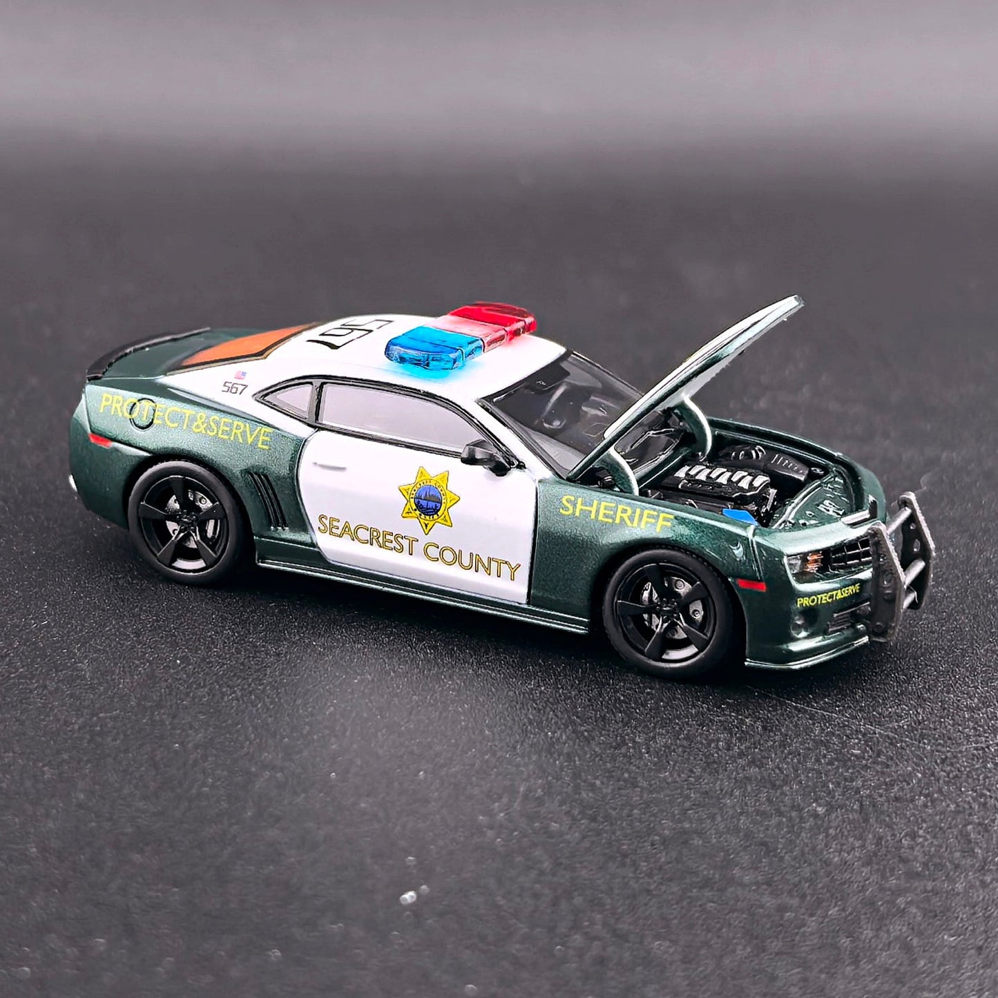1+1 Model 2010 Chevrolet Camaro SS Police from Need for Speed Hot Pursuit with opening hood, detailed engine and extra wheels.