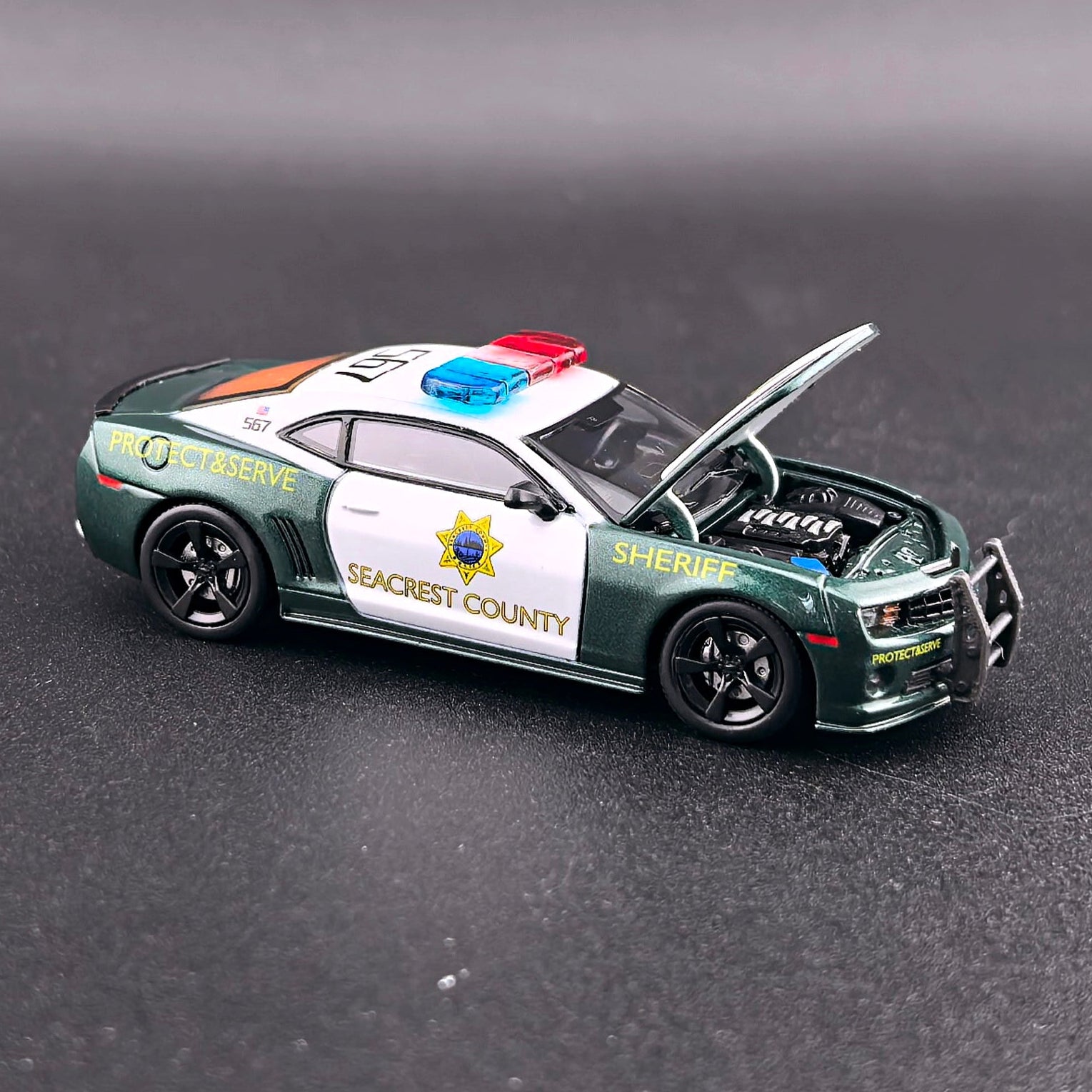 1+1 Model 2010 Chevrolet Camaro SS Police from Need for Speed Hot Pursuit with opening hood, detailed engine and extra wheels.