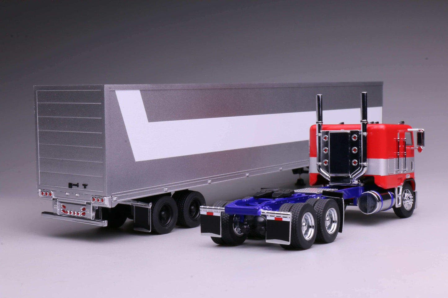 596 1980 Freightliner FL86 Optimus Prime from Transformers Generation 1, HEC 2026 Exclusive 1:64 model with opening cabin and detailed engine.