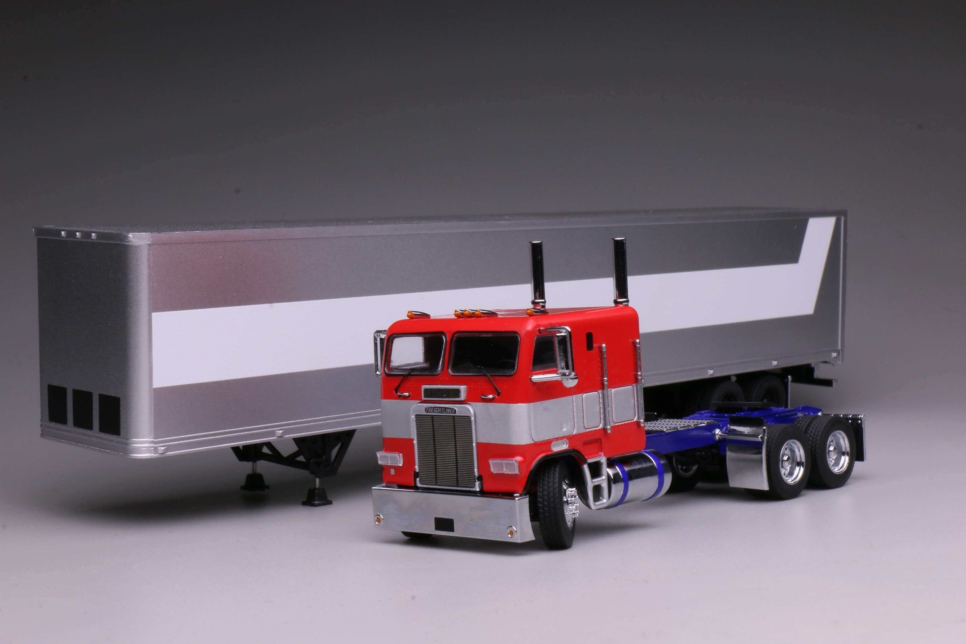596 1980 Freightliner FL86 Optimus Prime from Transformers Generation 1, HEC 2026 Exclusive 1:64 model with opening cabin and detailed engine.