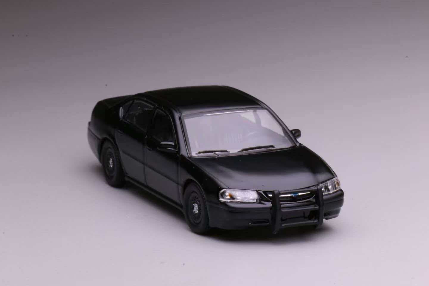 596 Models 2001 Chevrolet Impala 9C3 Undercover Police Package in matte black with front bull bar.