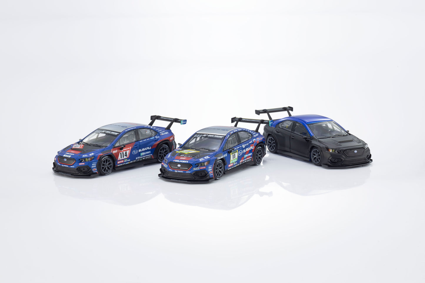 Kyosho 1:64 Subaru WRX STI NBR 2024 MOTN model with activated headlights and taillights.