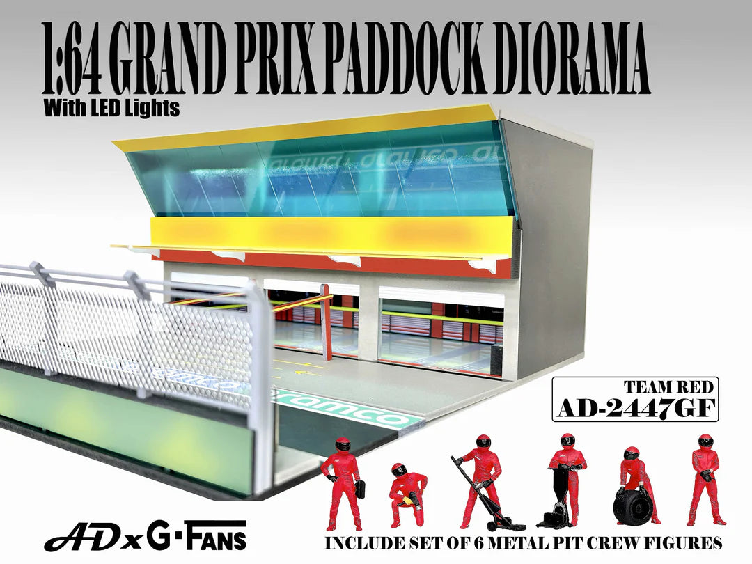 American Diorama Grand Prix Paddock Team Red 1:64 diorama with LED lighting, metal debris fence, and six pit crew figures.