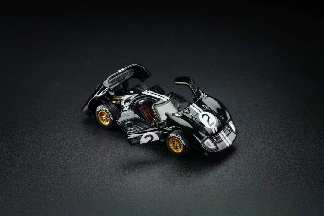 FG Model 1:64 Ford GT40 Mk II #2 Bruce McLaren Chris Amon 1966 Le Mans winner with opening panels.