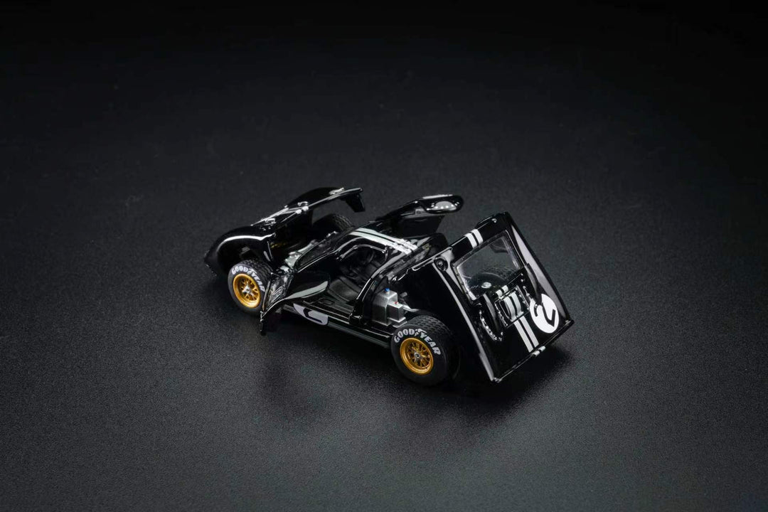 FG Model 1:64 Ford GT40 Mk II #2 Bruce McLaren Chris Amon 1966 Le Mans winner with opening panels.