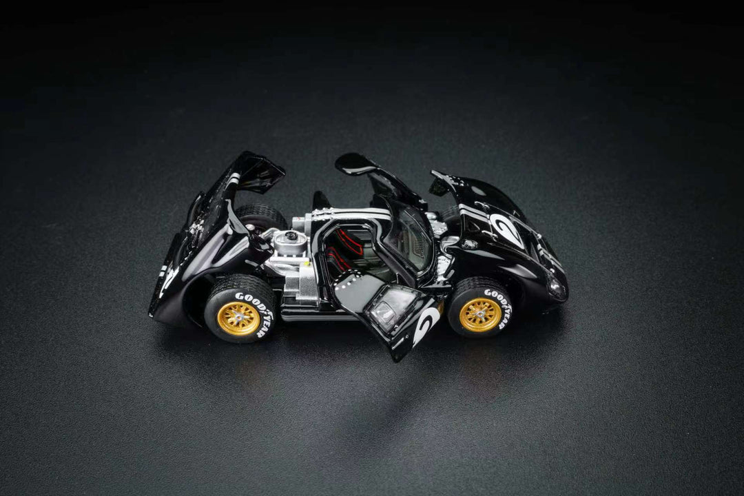FG Model 1:64 Ford GT40 Mk II #2 Bruce McLaren Chris Amon 1966 Le Mans winner with opening panels.