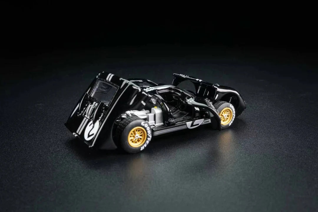 FG Model 1:64 Ford GT40 Mk II #2 Bruce McLaren Chris Amon 1966 Le Mans winner with opening panels.