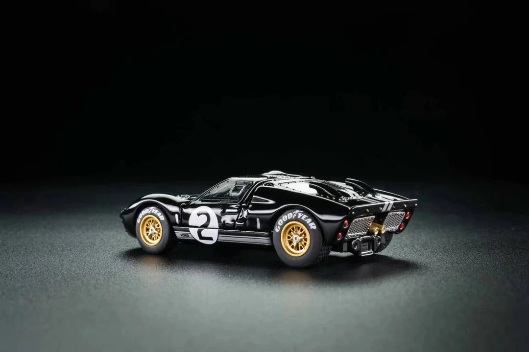 FG Model 1:64 Ford GT40 Mk II #2 Bruce McLaren Chris Amon 1966 Le Mans winner with opening panels.