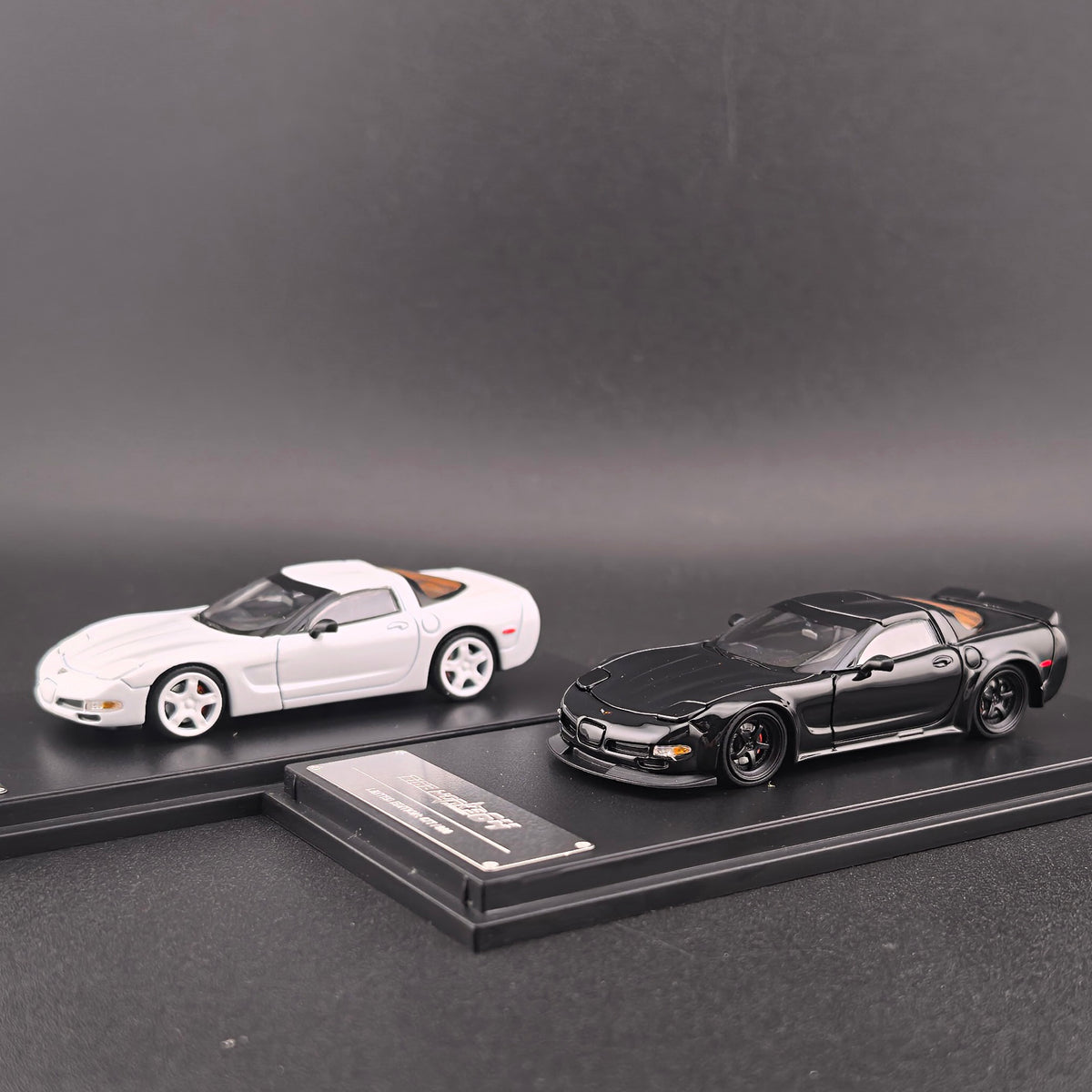 Fine Works 64 Chevrolet Corvette C5 in White Standard or Black Custom version with working pop-up headlights and acrylic case.