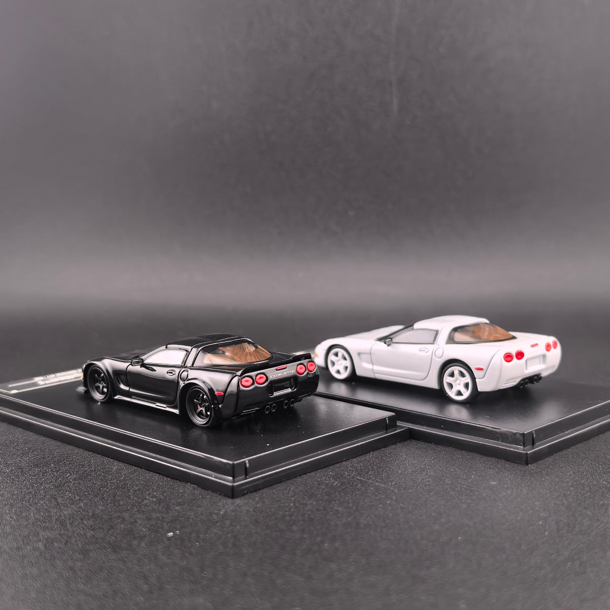 Fine Works 64 Chevrolet Corvette C5 in White Standard or Black Custom version with working pop-up headlights and acrylic case.