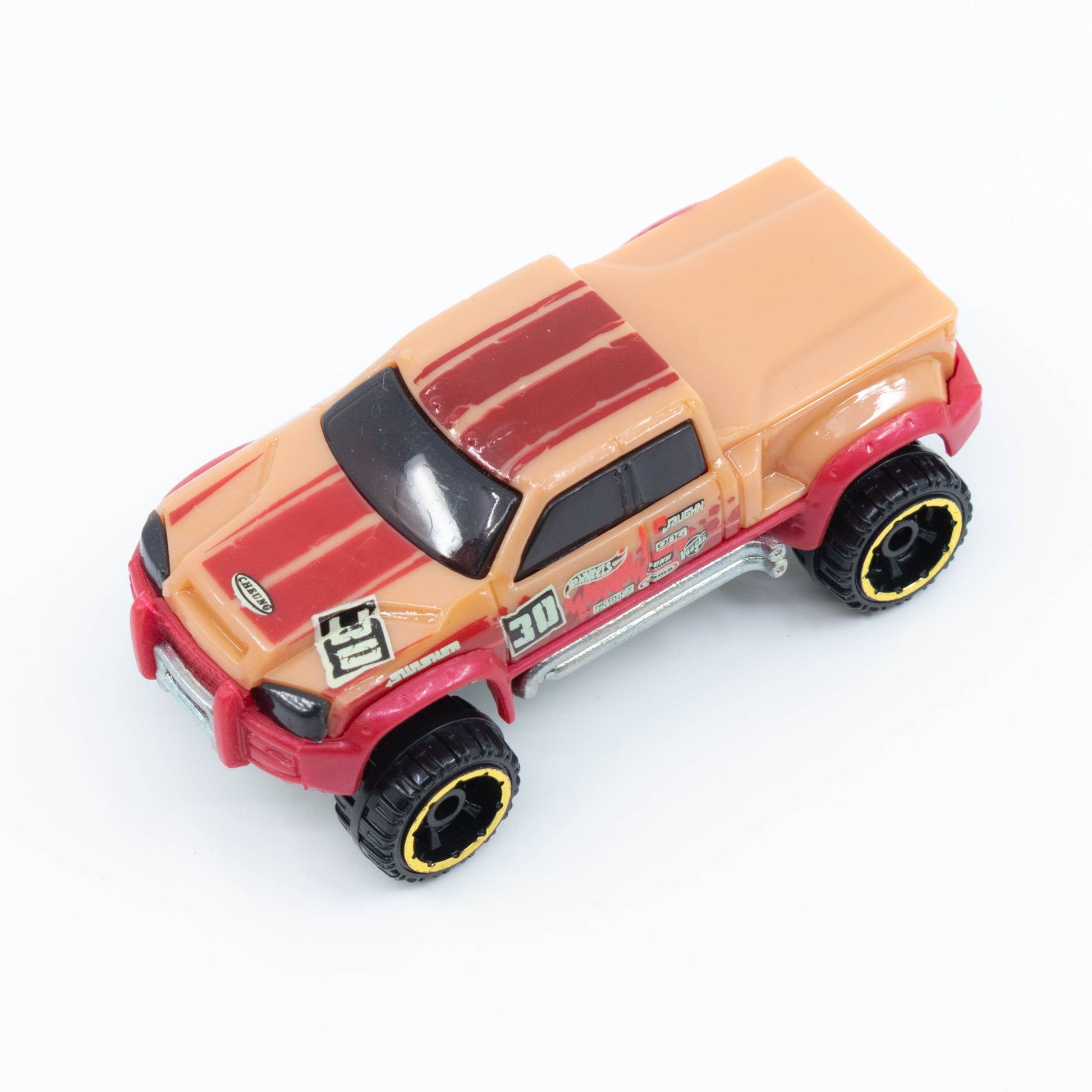 Hot Wheels Mega-Duty 1:64 diecast truck with lifted suspension and rugged utility styling. Top