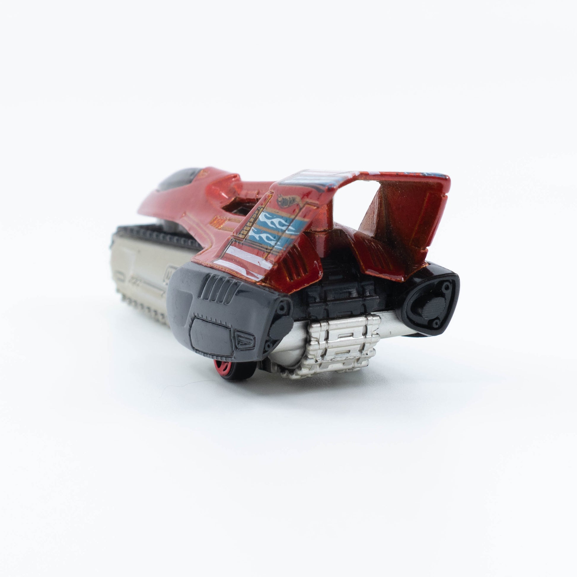 Hot Wheels Tread Air 1:64 scale diecast vehicle with large off-road caterpillar and futuristic design. Back
