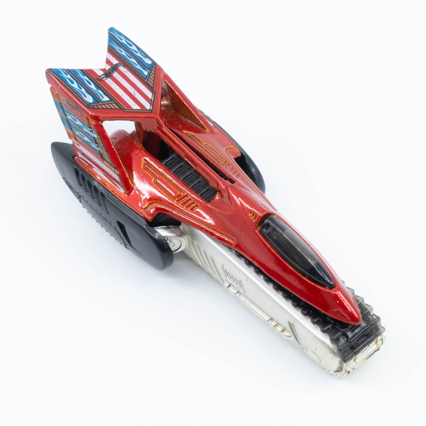 Hot Wheels Tread Air 1:64 scale diecast vehicle with large off-road caterpillar and futuristic design. Top