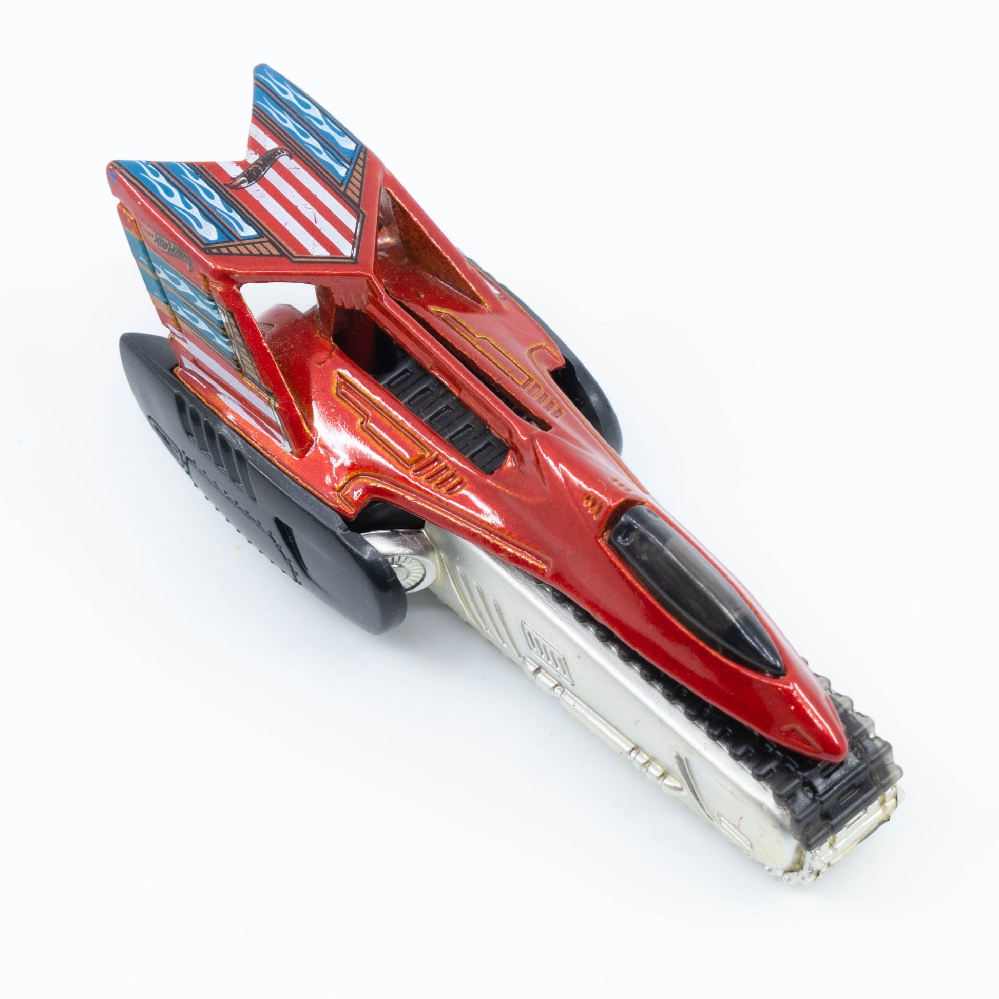 Hot Wheels Tread Air 1:64 scale diecast vehicle with large off-road caterpillar and futuristic design. Top