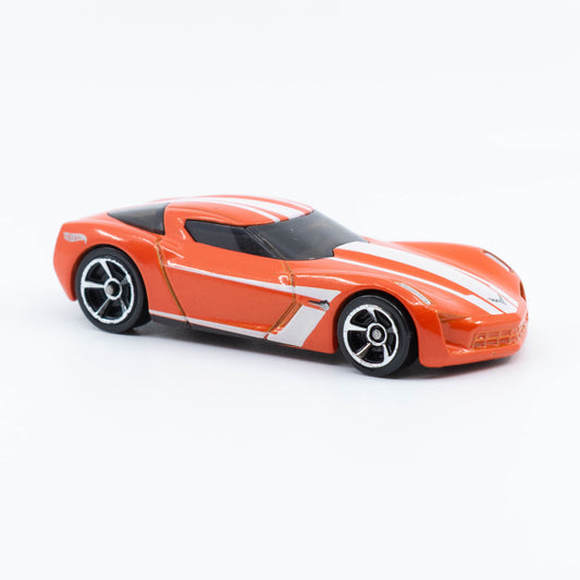 Hot Wheels 2009 Corvette Stingray Concept diecast with futuristic silver design and aerodynamic curves. Front