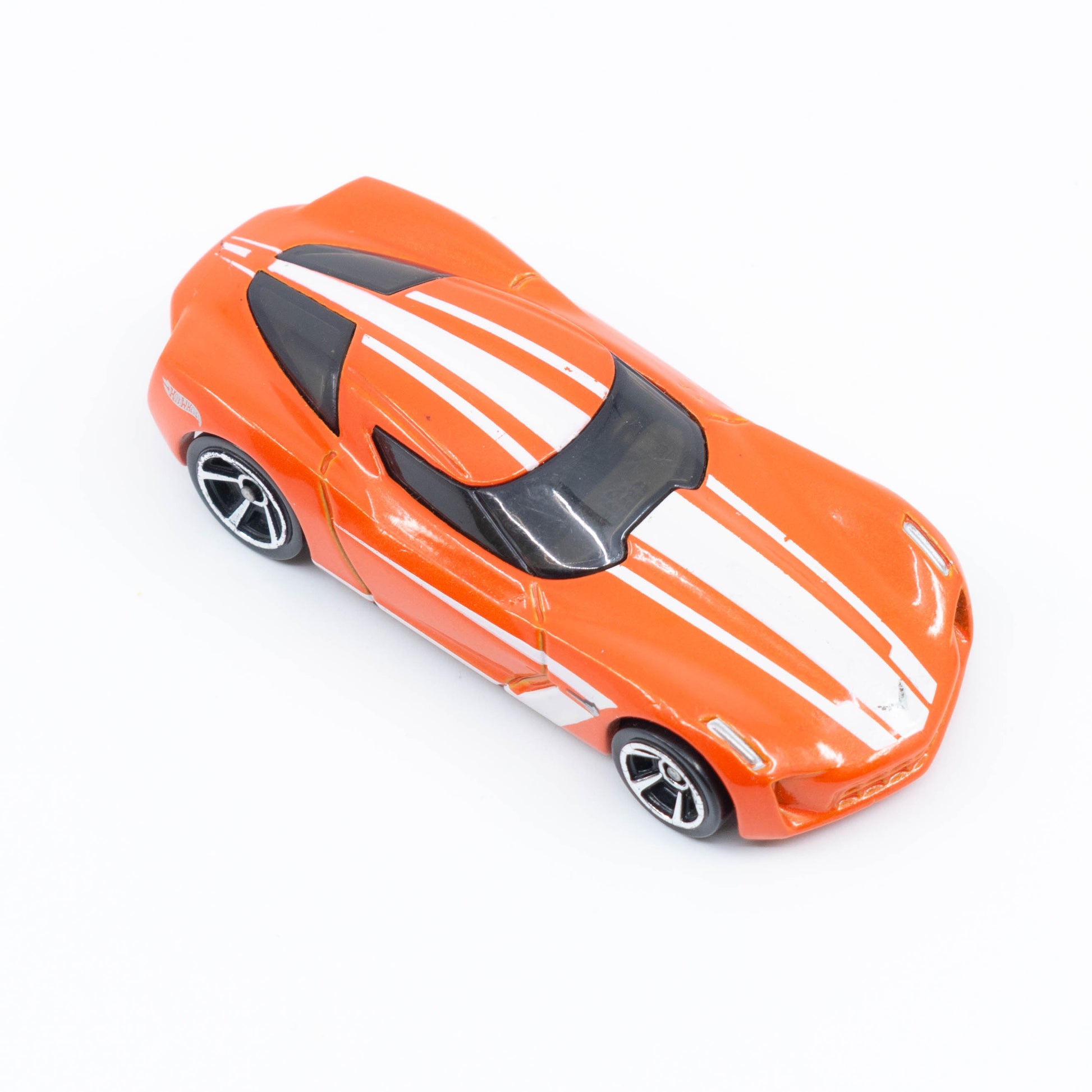 Hot Wheels 2009 Corvette Stingray Concept diecast with futuristic silver design and aerodynamic curves. Top