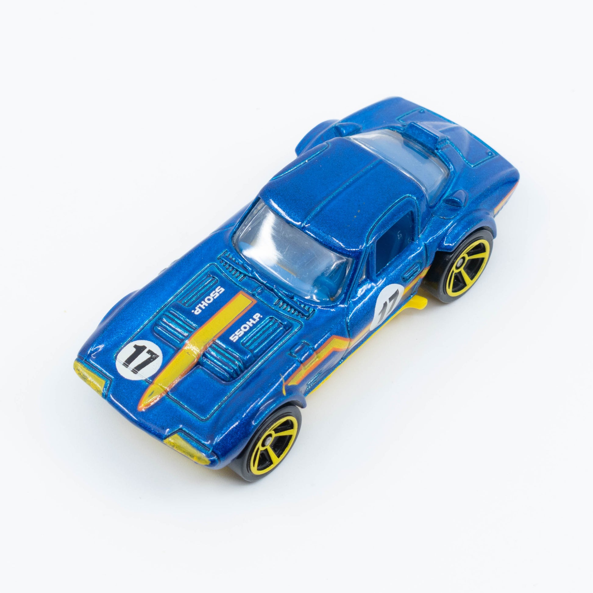 Hot Wheels Corvette Grand Sport diecast with flared fenders and classic race styling in 1:64 scale. Top