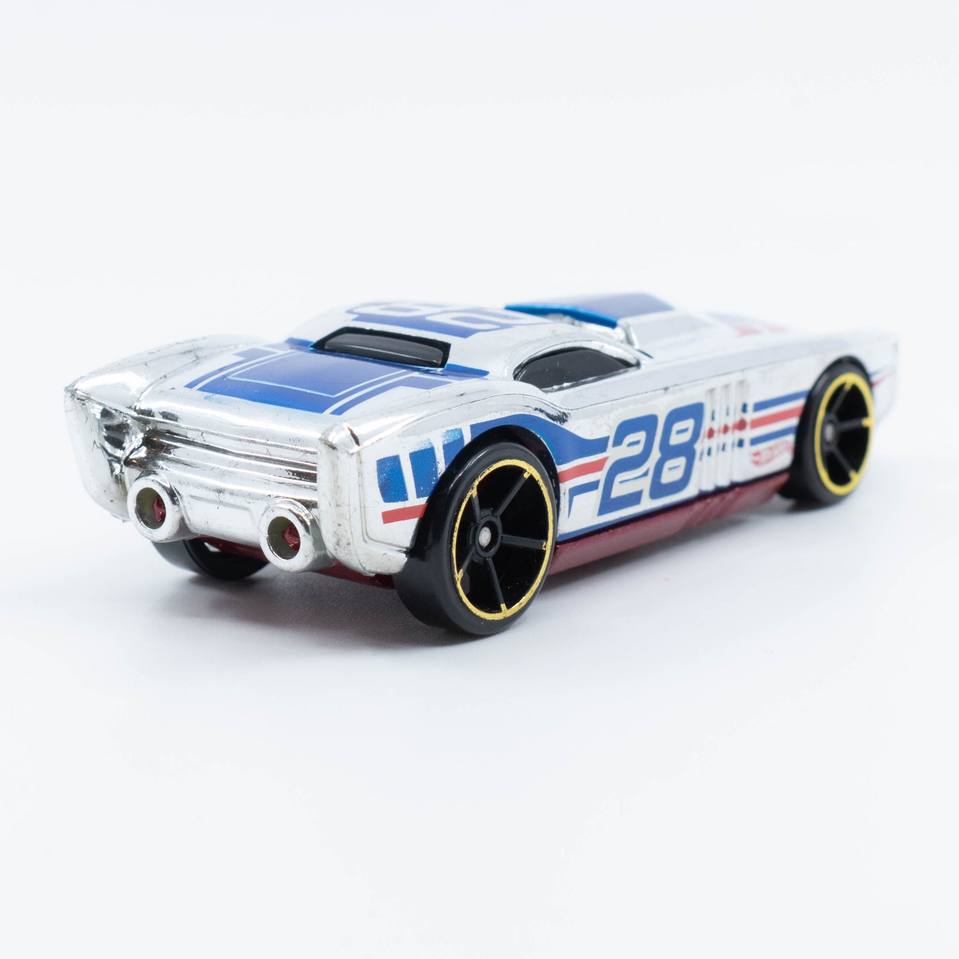 Hot Wheels The Gov’ner 1:64 scale diecast car with low-profile body and sporty chrome detailing. Back