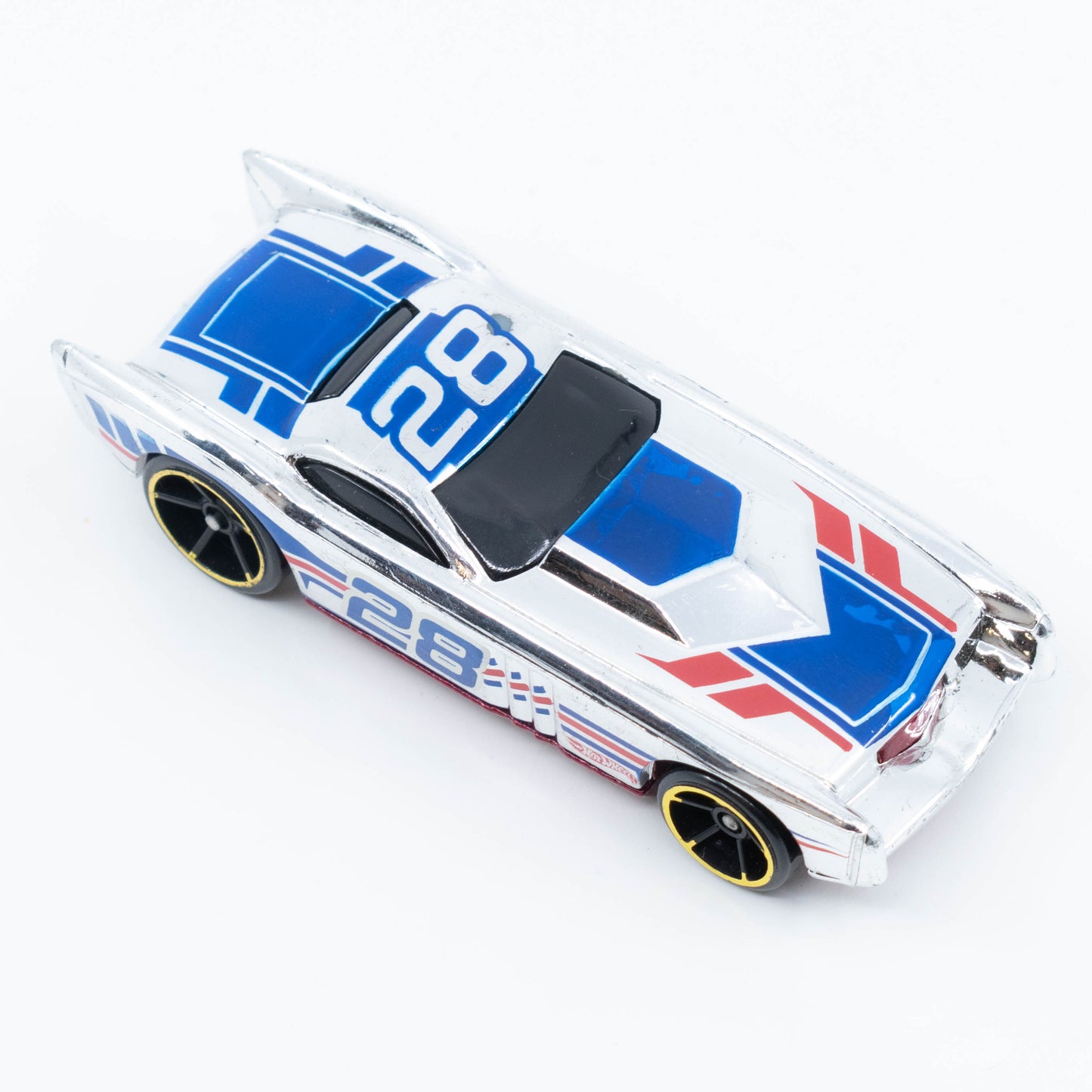 Hot Wheels The Gov’ner 1:64 scale diecast car with low-profile body and sporty chrome detailing. Top