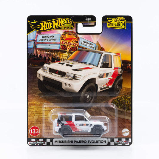 Hot Wheels Boulevard – Mitsubishi Pajero Evolution in white Ralliart livery with red accents, featuring off-road Real Riders tires and detailed rally graphics.