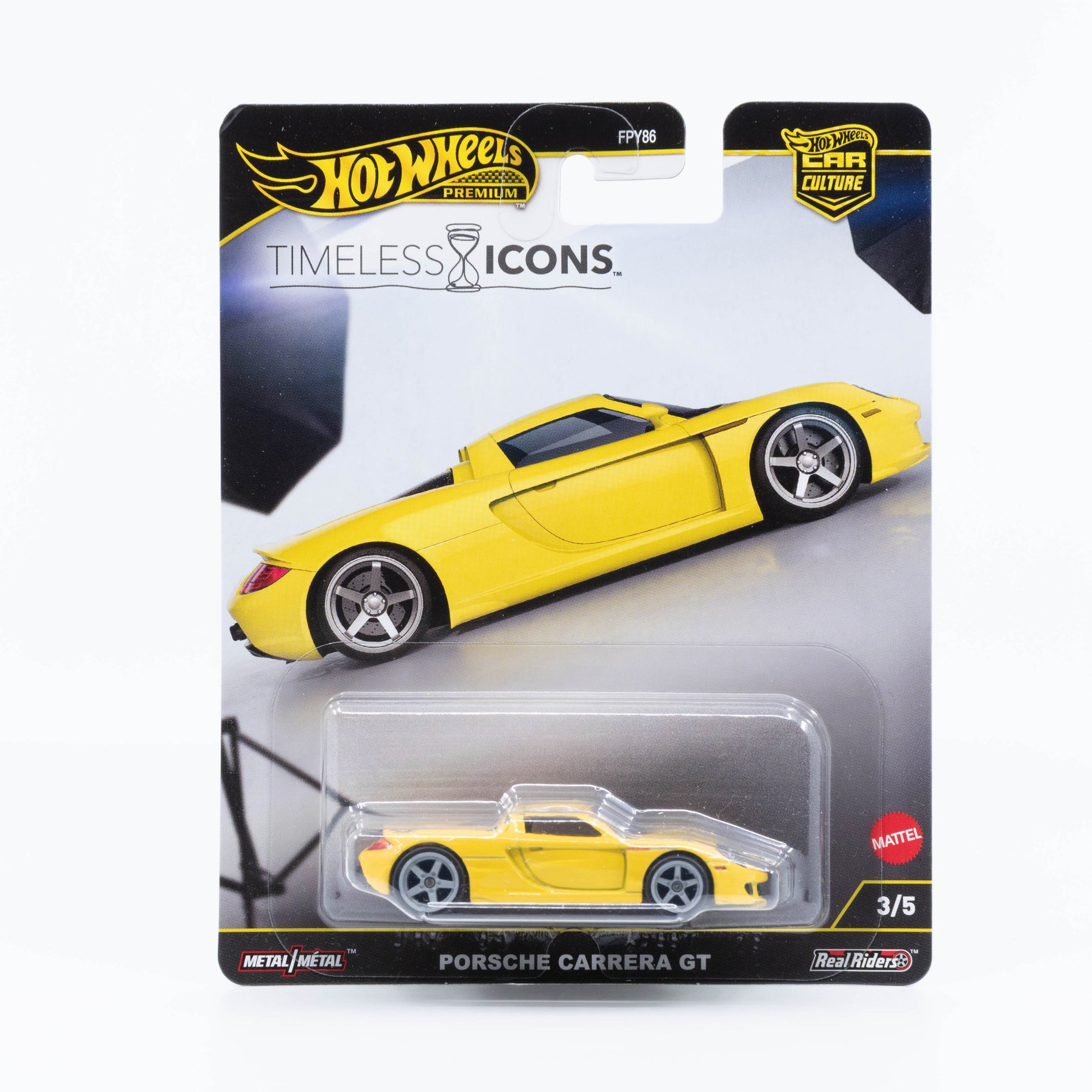 Hot Wheels 1:64 Porsche Carrera GT yellow premium model from Timeless Icons series.