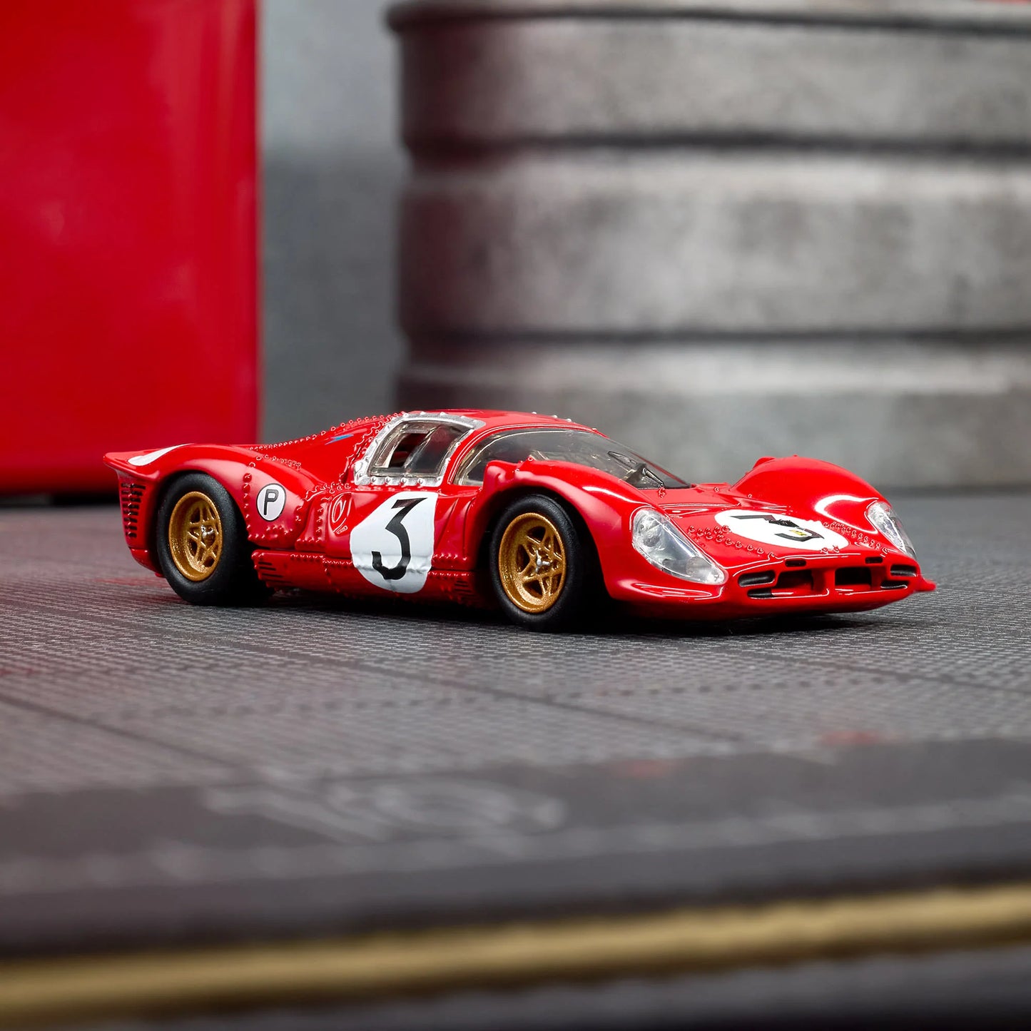 1:64 Hot Wheels Elite 64 Ferrari 330 P4 Rosso Corsa with opening rear clamshell and engine detail.