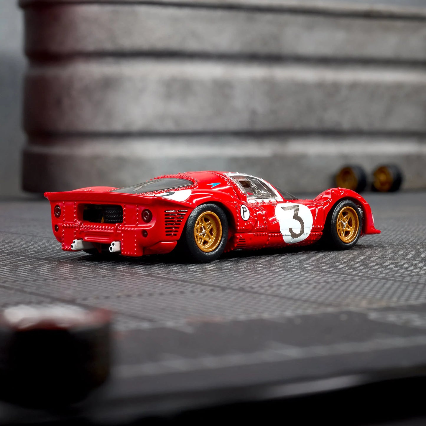 1:64 Hot Wheels Elite 64 Ferrari 330 P4 Rosso Corsa with opening rear clamshell and engine detail.