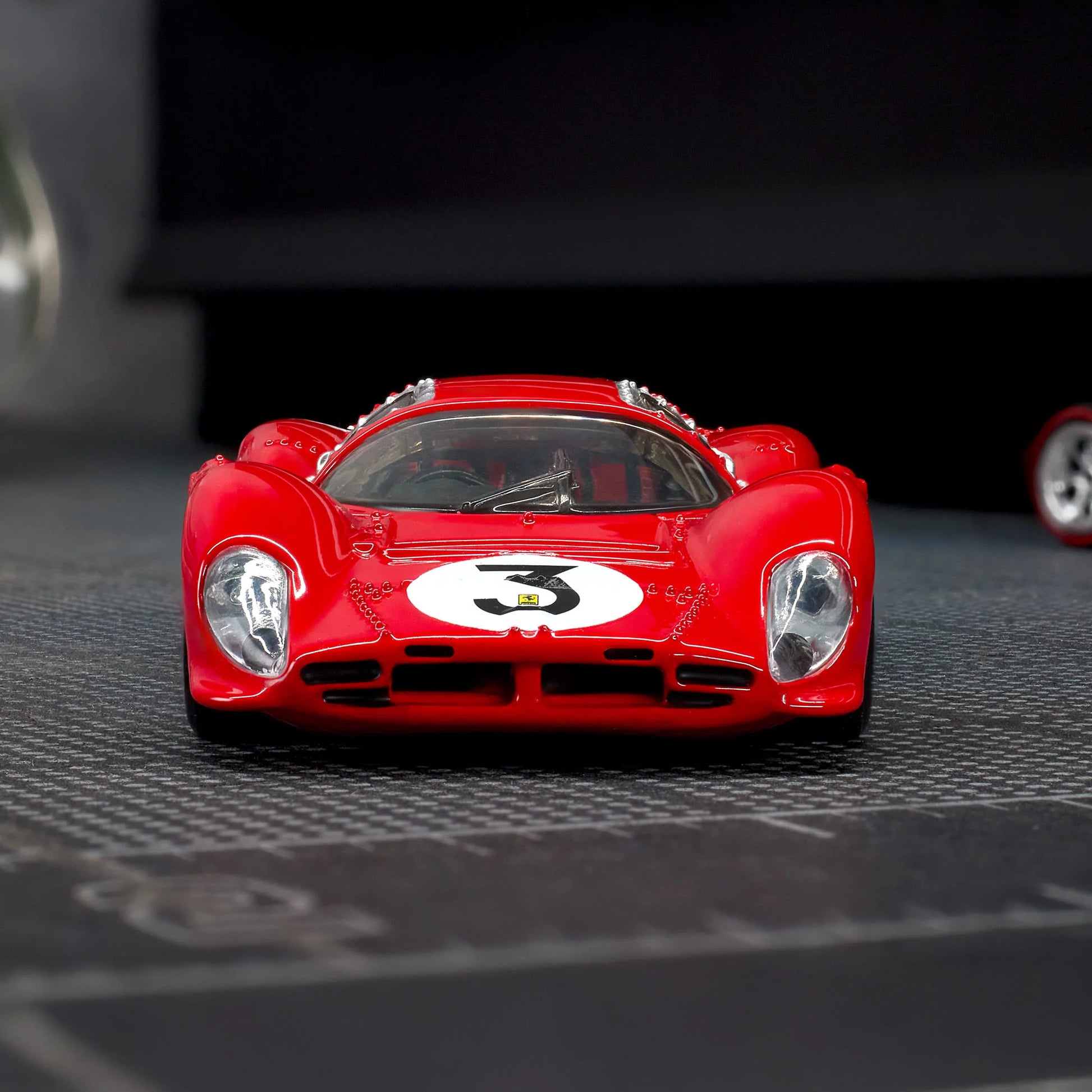 1:64 Hot Wheels Elite 64 Ferrari 330 P4 Rosso Corsa with opening rear clamshell and engine detail.