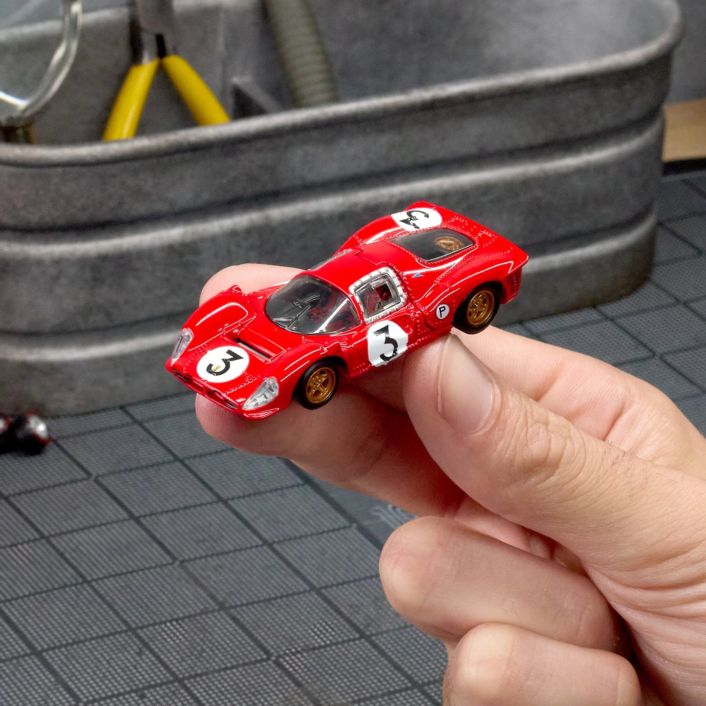 1:64 Hot Wheels Elite 64 Ferrari 330 P4 Rosso Corsa with opening rear clamshell and engine detail.