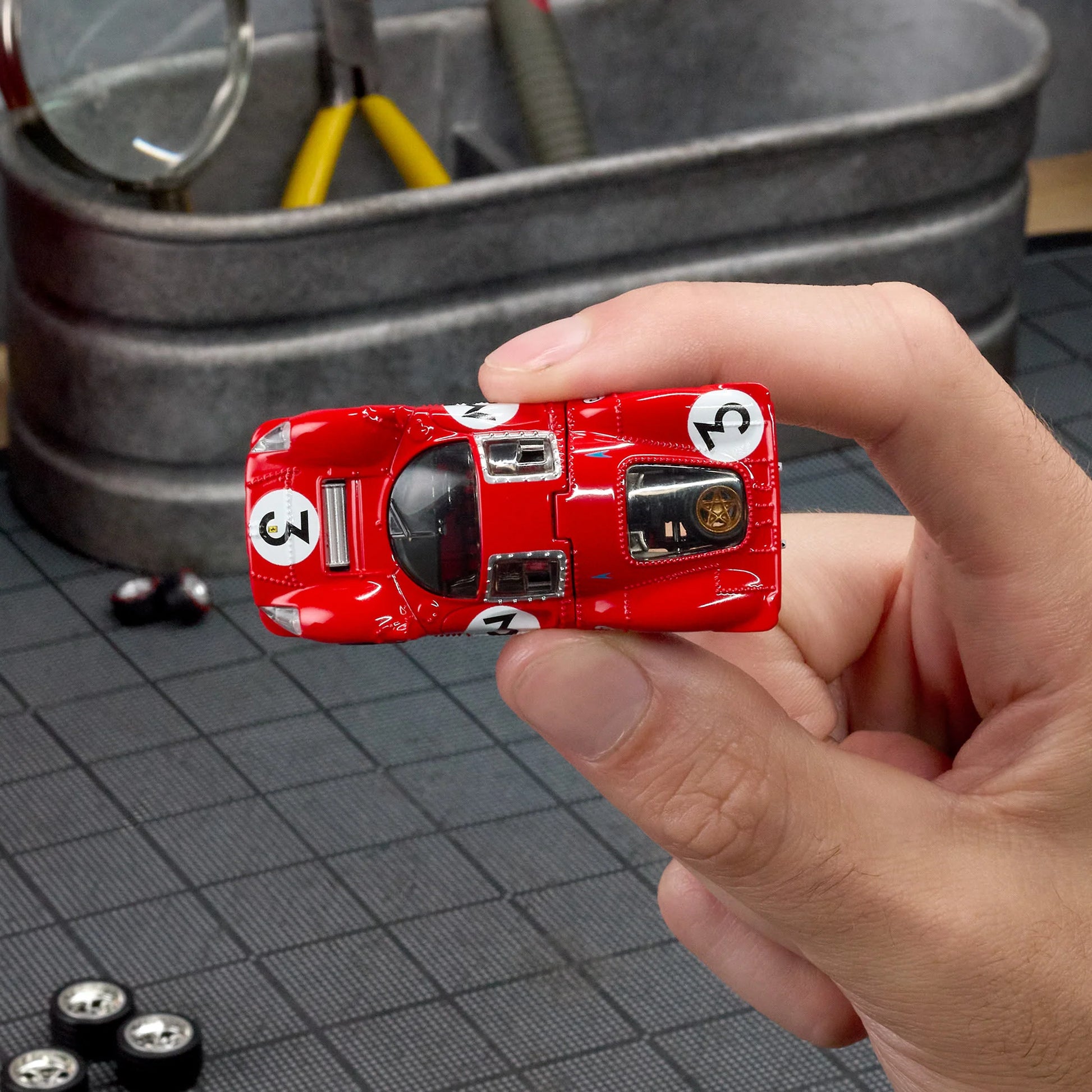 1:64 Hot Wheels Elite 64 Ferrari 330 P4 Rosso Corsa with opening rear clamshell and engine detail.