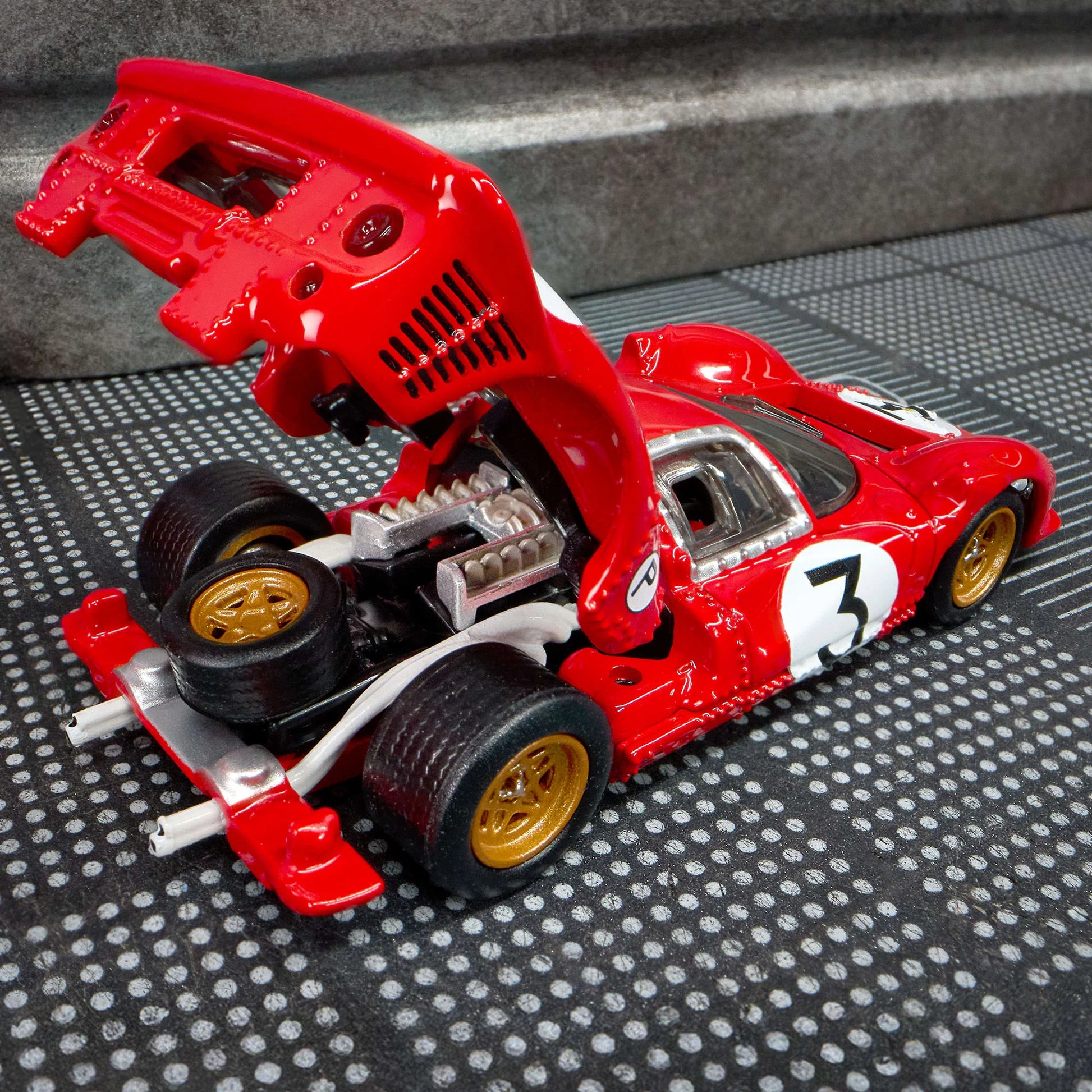 1:64 Hot Wheels Elite 64 Ferrari 330 P4 Rosso Corsa with opening rear clamshell and engine detail.