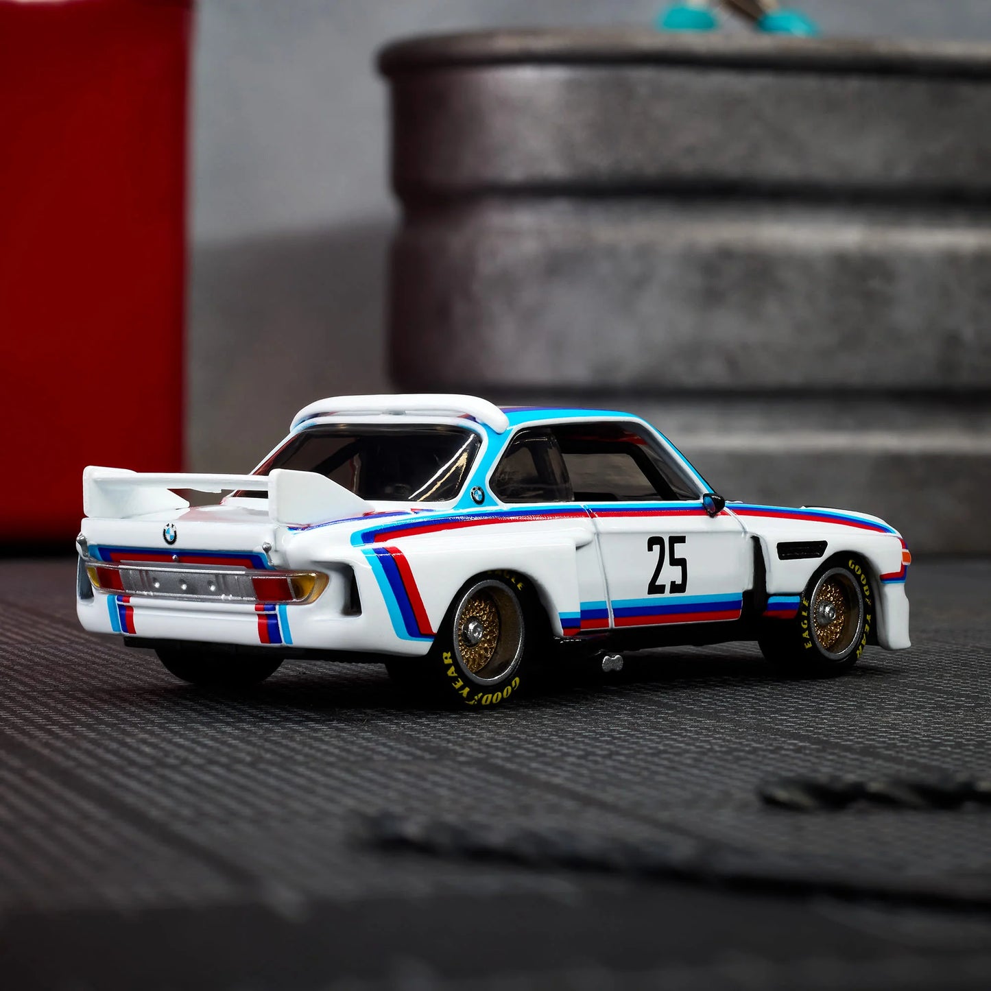 Hot Wheels Elite 64 1975 BMW 3.0 CSL Race gloss white premium die-cast model.