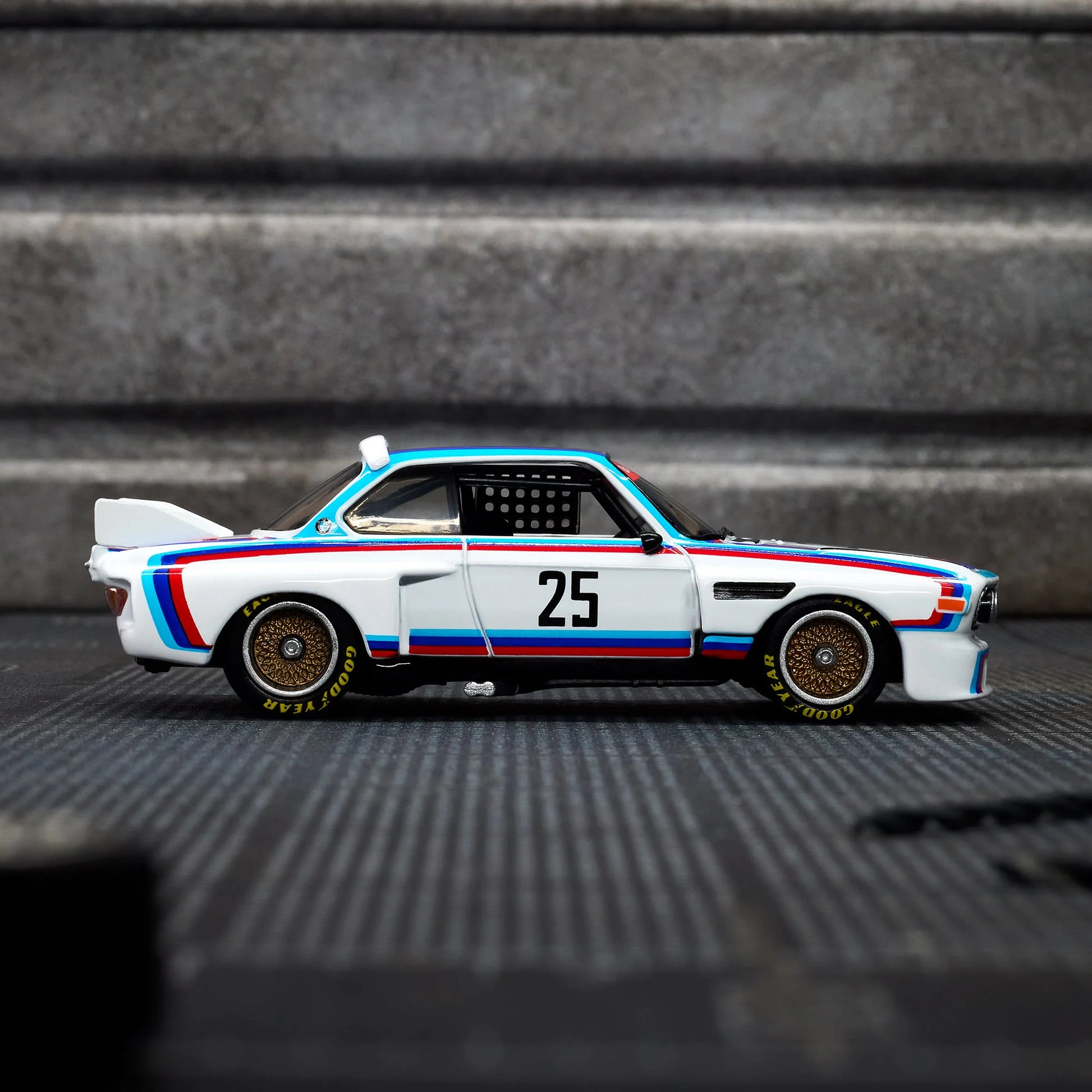 Hot Wheels Elite 64 1975 BMW 3.0 CSL Race gloss white premium die-cast model.