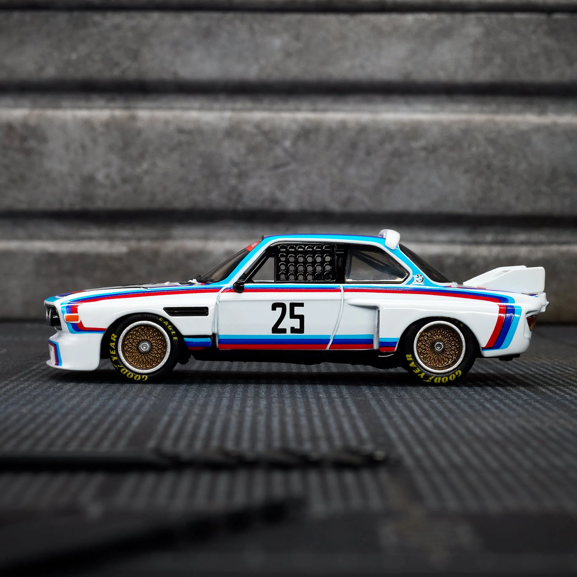 Hot Wheels Elite 64 1975 BMW 3.0 CSL Race gloss white premium die-cast model.