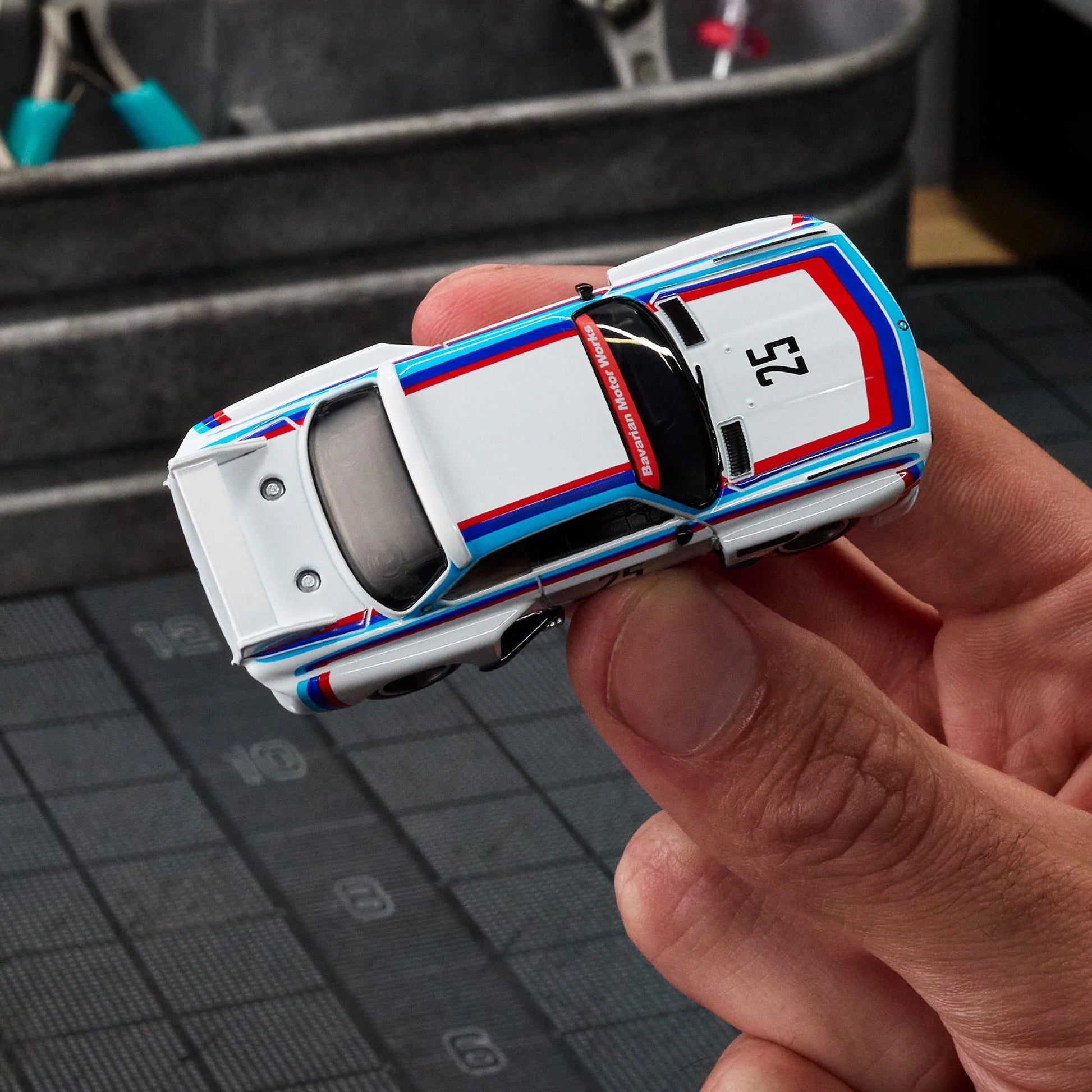 Hot Wheels Elite 64 1975 BMW 3.0 CSL Race gloss white premium die-cast model.