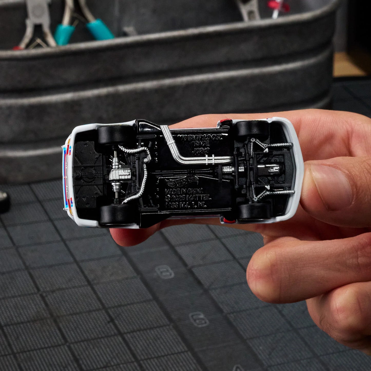 Hot Wheels Elite 64 1975 BMW 3.0 CSL Race gloss white premium die-cast model.