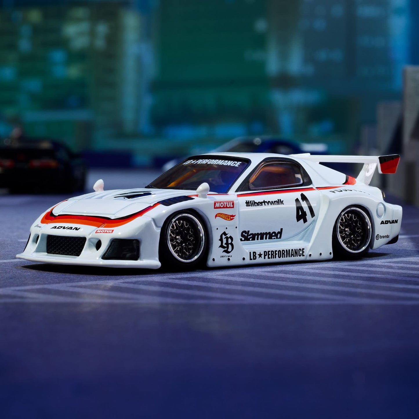 Hot Wheels Elite 64 Mazda RX-7 Liberty Walk in white LBWK race livery.