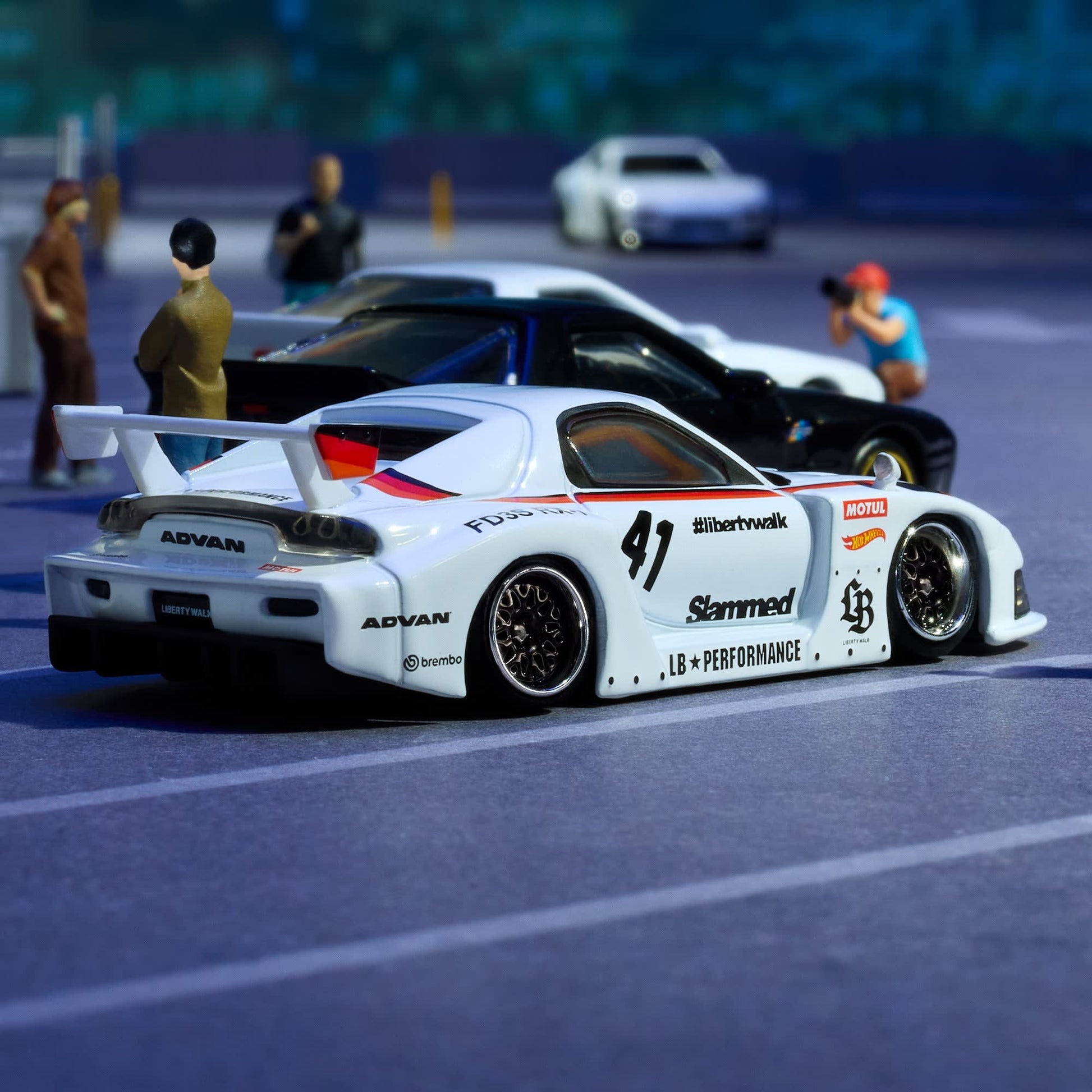 Hot Wheels Elite 64 Mazda RX-7 Liberty Walk in white LBWK race livery.