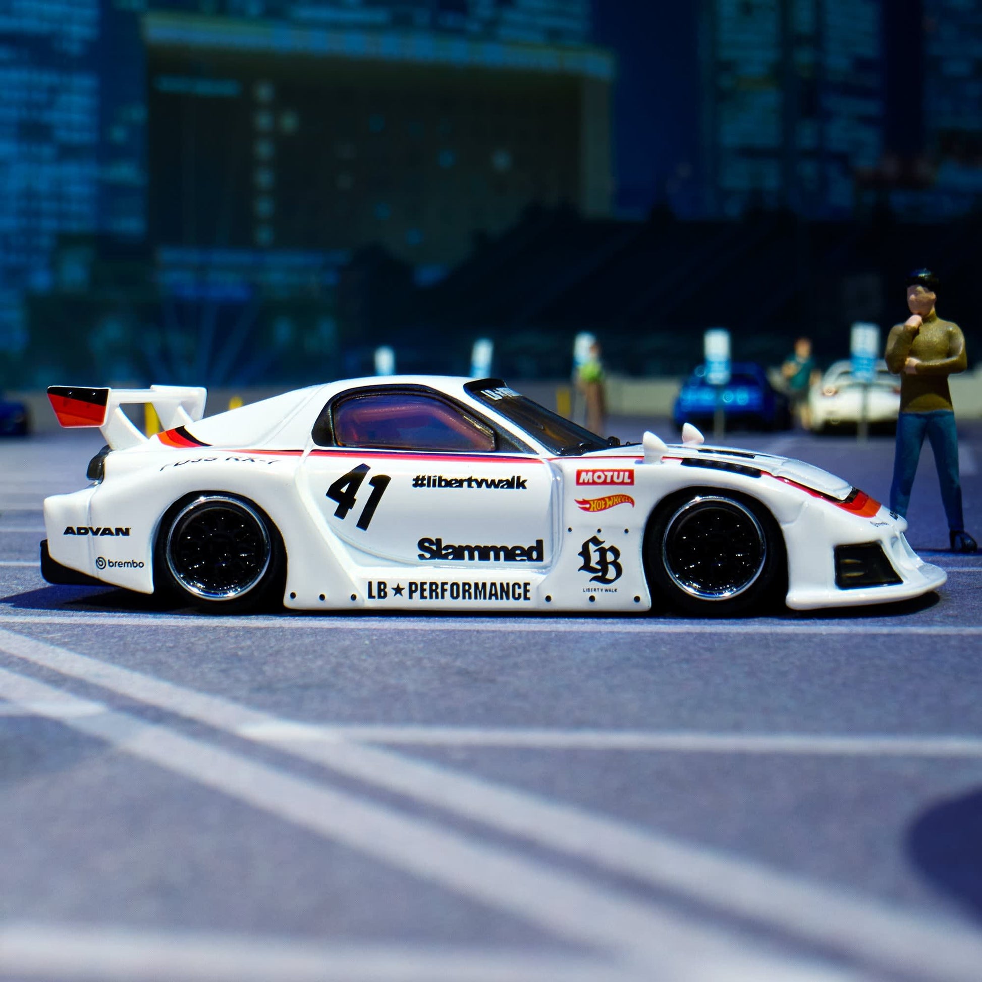 Hot Wheels Elite 64 Mazda RX-7 Liberty Walk in white LBWK race livery.
