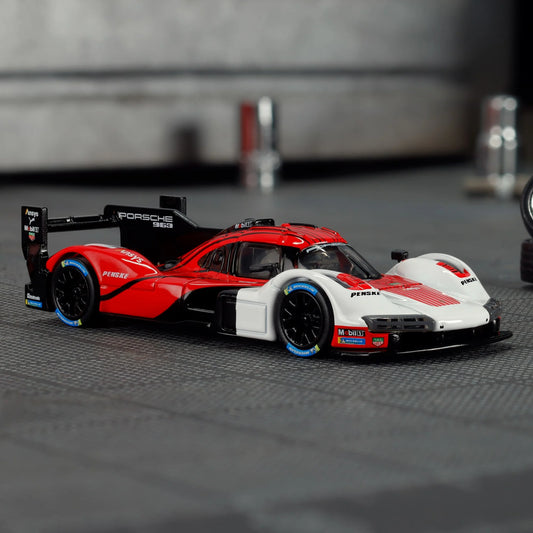 Hot Wheels Elite 64 Porsche 963 in Penske Team livery, featuring red, white, and black racing colors, detailed aero bodywork, and Real Riders wheels.