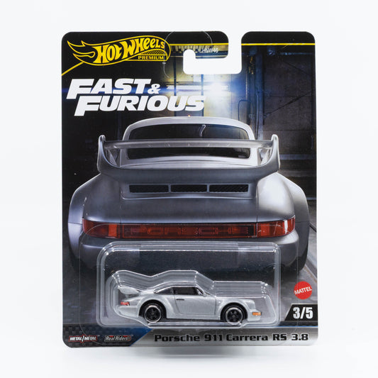 Hot Wheels 1:64 scale Porsche 911 Carrera RS 3.8 in silver, modeled after the car from the elevator scene in Fast & Furious: Tokyo Drift.