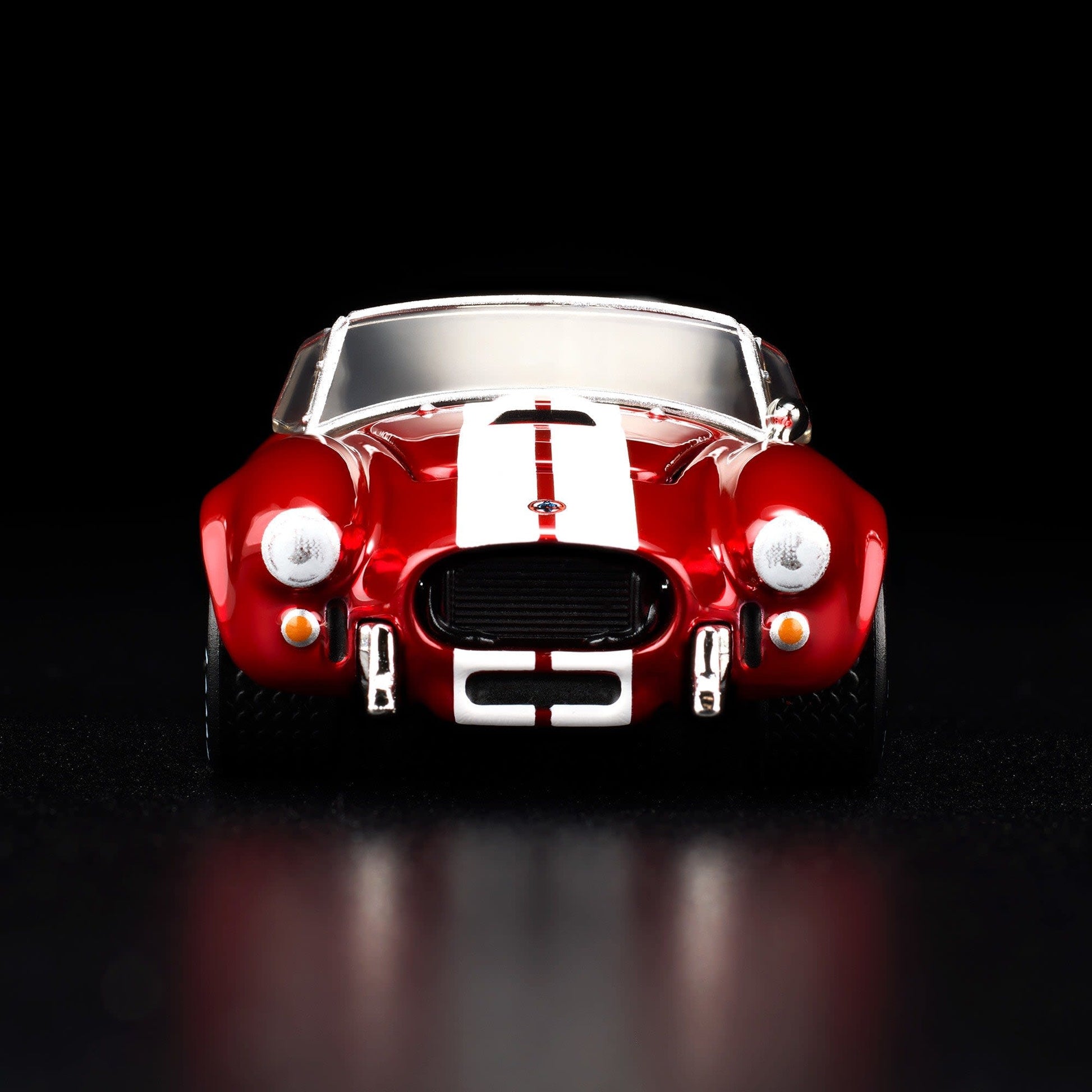 Hot Wheels RLC 2026 membership car, 1965 Shelby Cobra 427 S/C in Spectraflame bright red with opening hood and detailed V8 engine.