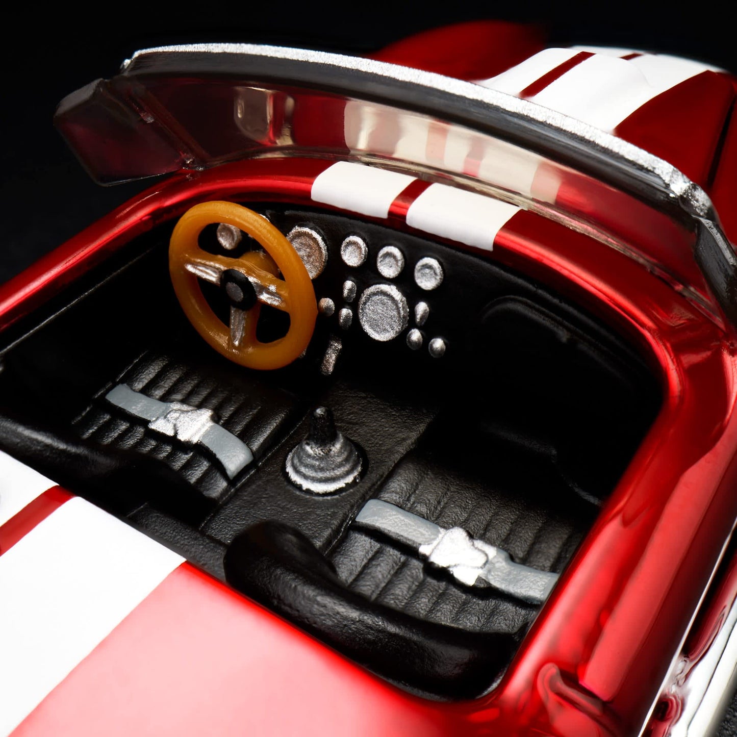 Hot Wheels RLC 2026 membership car, 1965 Shelby Cobra 427 S/C in Spectraflame bright red with opening hood and detailed V8 engine.