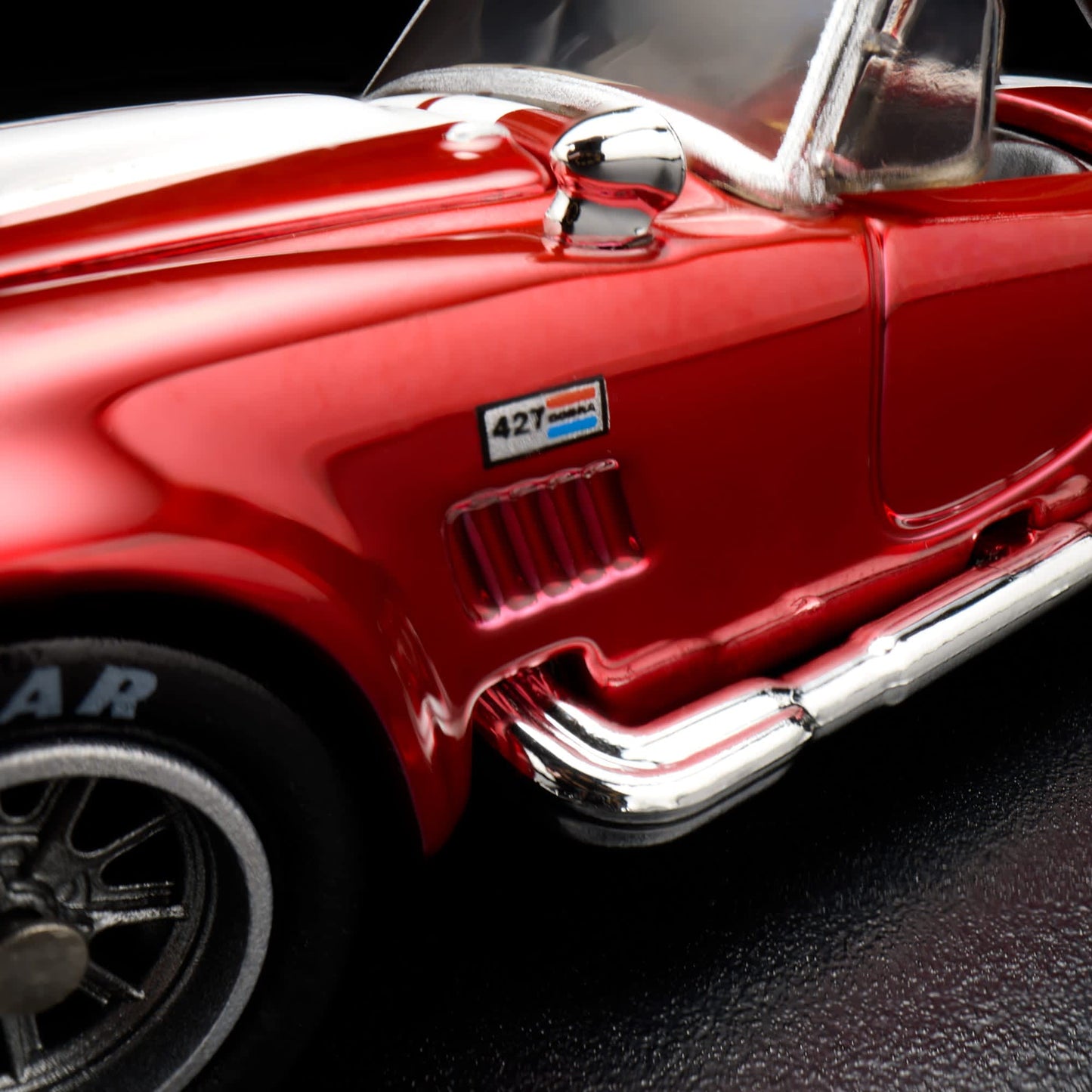 Hot Wheels RLC 2026 membership car, 1965 Shelby Cobra 427 S/C in Spectraflame bright red with opening hood and detailed V8 engine.