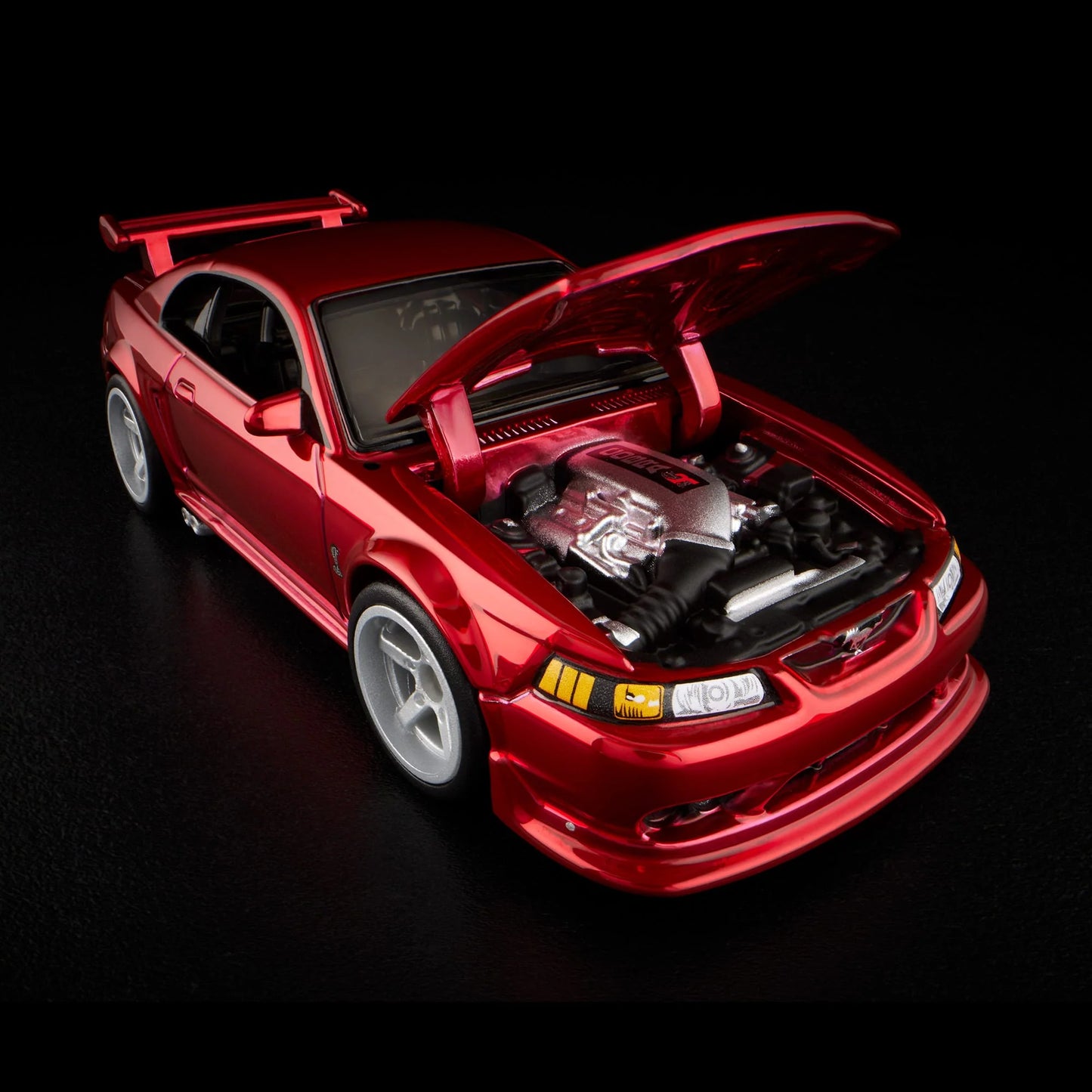 1:64 Hot Wheels RLC 2000 Ford Mustang SVT Cobra R Spectraflame bright red with opening hood.