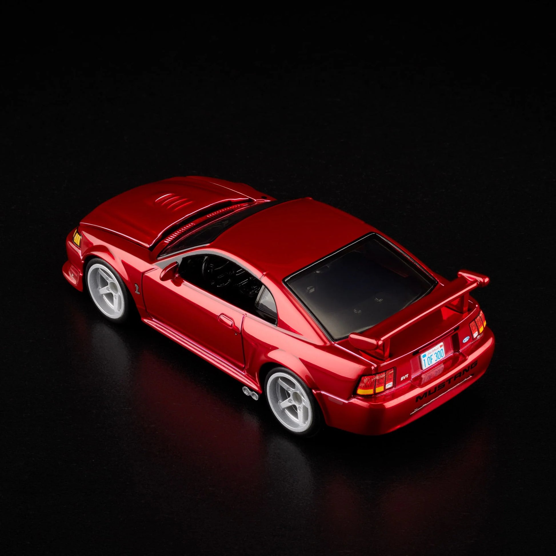1:64 Hot Wheels RLC 2000 Ford Mustang SVT Cobra R Spectraflame bright red with opening hood.